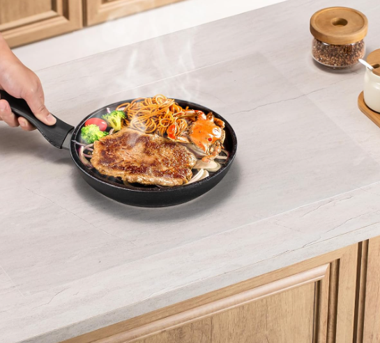 Transparent silicone countertop protector mat with non-slip, heat-resistant design for kitchens and dining tables